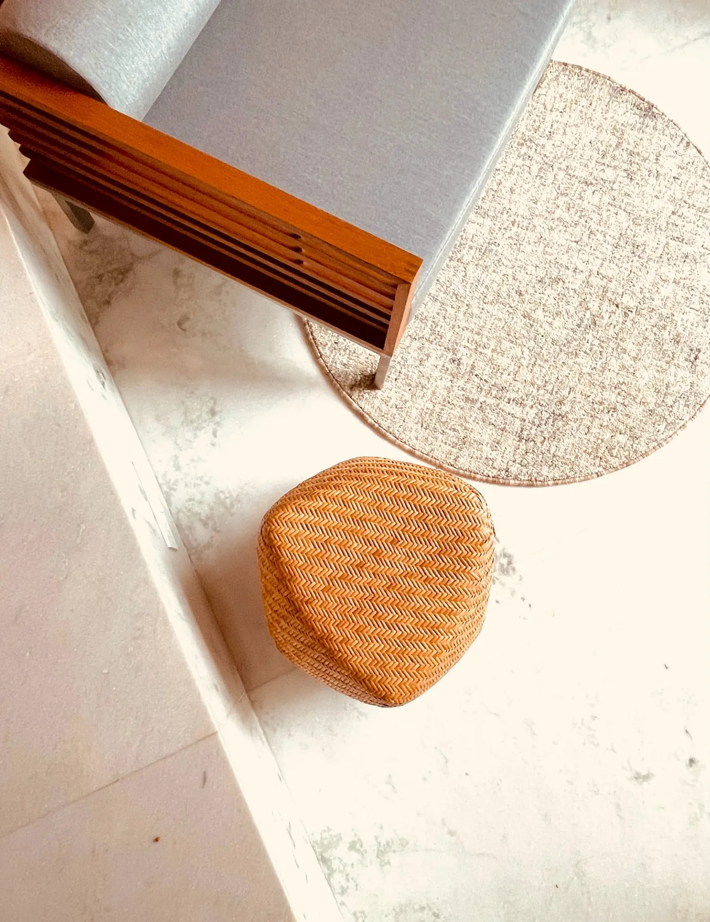 Close view of woven textures, stone and timber in a Devasom interior